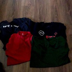 Five medium sized shirts